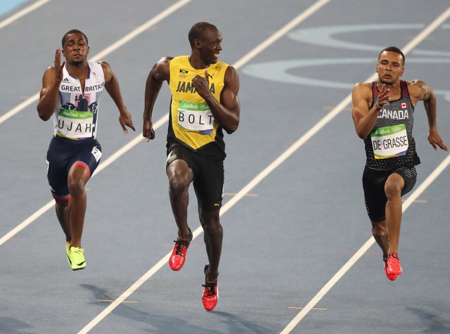 
Thi Olympic nhưng nhìn tác phong của Usain Bolt chẳng khác nào anh ta đang chạy bộ trong công viên.
