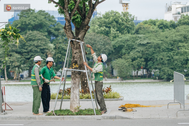 Chùm ảnh: Tiết trời se lạnh, người Hà Nội khoác thêm áo ấm, hưởng trọn không khí mát lành của mùa Thu - Ảnh 12.