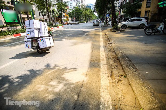  Hà Nội xuất hiện cao ốc dát vàng gây chói lóa trong ngày hè oi bức  - Ảnh 7.