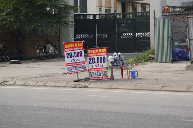 Hà Nội: Người dân đổ xô đi mua bảo hiểm xe máy, nơi bán giá siêu rẻ 20.000đ/ năm mọc lên nhan nhản ở lề đường - Ảnh 6.