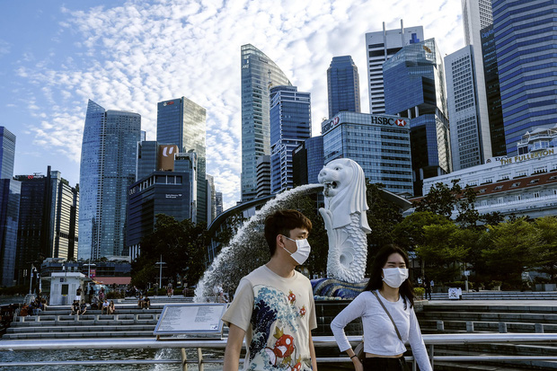 Đứng trước cơn sóng thần bệnh nhân Covid-19, Singapore đã ứng phó ra sao để duy trì tỷ lệ tử vong thấp? - Ảnh 1. Đứng trước cơn sóng thần bệnh nhân Covid-19, Singapore đã ứng phó ra sao để duy trì tỷ lệ tử vong thấp? - Ảnh 1.