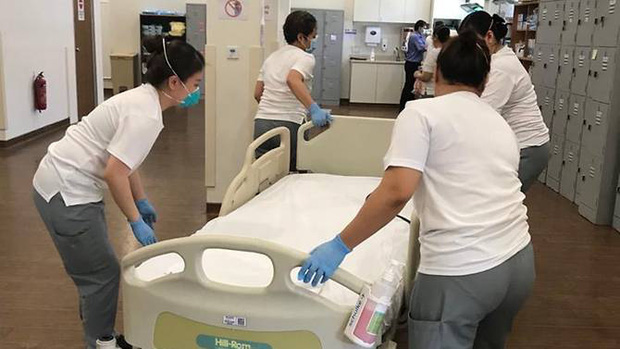 Đứng trước cơn sóng thần bệnh nhân Covid-19, Singapore đã ứng phó ra sao để duy trì tỷ lệ tử vong thấp? - Ảnh 4. Đứng trước cơn sóng thần bệnh nhân Covid-19, Singapore đã ứng phó ra sao để duy trì tỷ lệ tử vong thấp? - Ảnh 4.