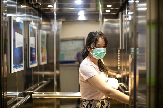 Ca “siêu lây nhiễm” Covid-19 ở Trung Quốc: Lây 71 người đi chung thang máy - Ảnh 1.