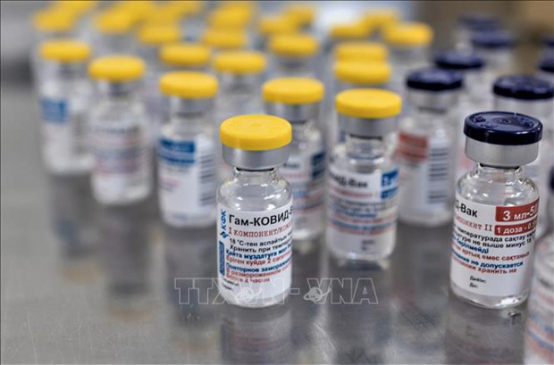 WHO cảnh báo hậu quả của việc tranh giành “miếng bánh vaccine” - Ảnh 1.