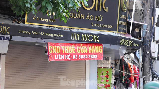  Nhiều cửa hàng kinh doanh ở Hà Nội bị dán thông báo ngừng cấp điện nước vì không đóng phí  - Ảnh 4.