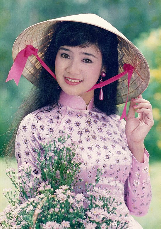 NSND Thu Hà: Nữ hoàng ảnh lịch thập niên 90 và cuộc sống ở tuổi 52 - Ảnh 2.