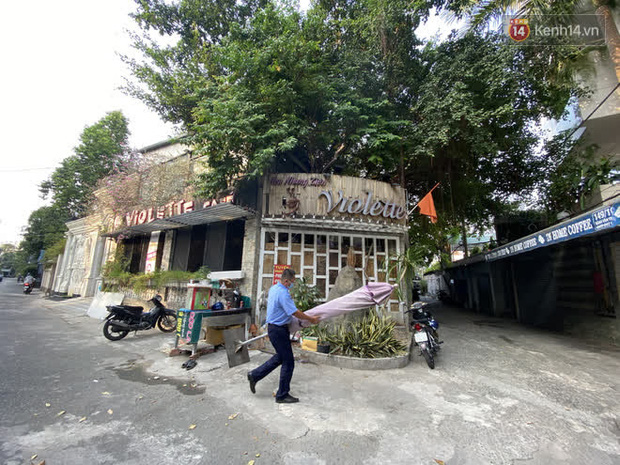 Cận cảnh quán cafe, quán ăn và tiệm massage ở Sài Gòn bị phong toả vì công chứng viên mắc Covid-19 từng ghé qua - Ảnh 4.