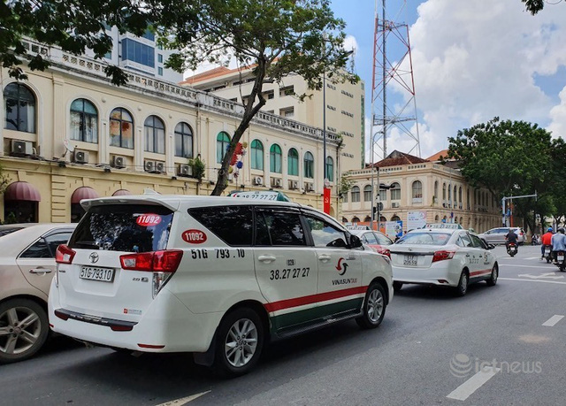  Taxi, taxi công nghệ chở khách tại TP.HCM phải mở cửa sổ  - Ảnh 1.