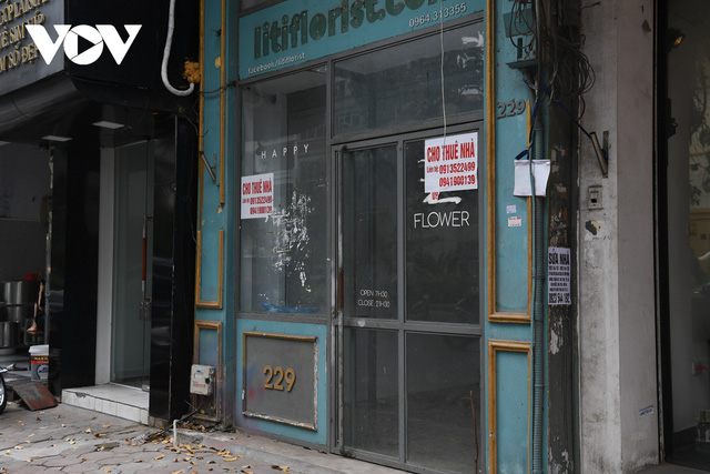 Hình ảnh các cửa hàng kinh doanh tại Hà Nội đóng cửa vì dịch COVID-19 - Ảnh 13.