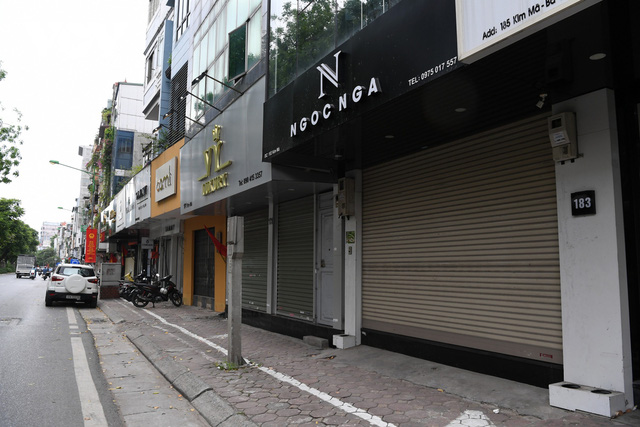 Hình ảnh các cửa hàng kinh doanh tại Hà Nội đóng cửa vì dịch COVID-19 - Ảnh 3.
