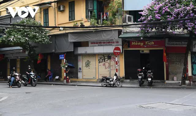 Hình ảnh các cửa hàng kinh doanh tại Hà Nội đóng cửa vì dịch COVID-19 - Ảnh 5.