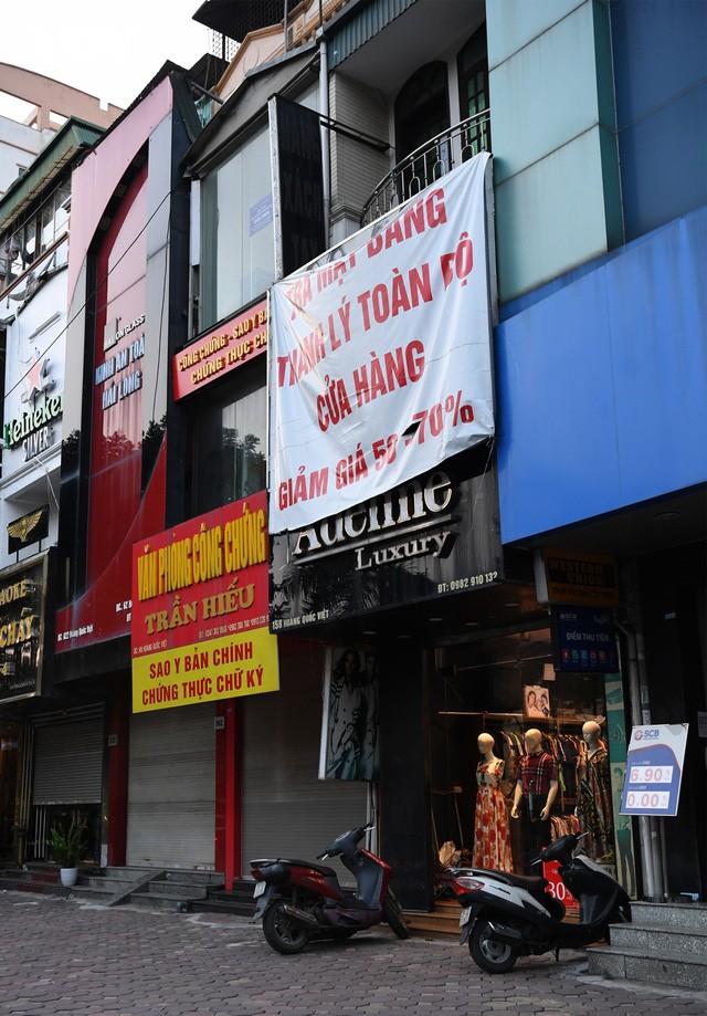 Hình ảnh các cửa hàng kinh doanh tại Hà Nội đóng cửa vì dịch COVID-19 - Ảnh 7.