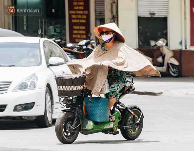  Nắng nóng gay gắt ở Hà Nội và Bắc Bộ kéo dài đến cuối tuần, có nơi đạt đỉnh trên 40 độ C - Ảnh 1.