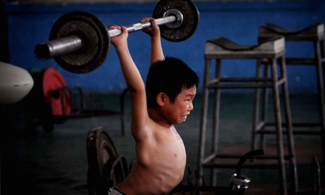 Giấc mơ vô địch Olympic của những đứa trẻ ở lò đào tạo thể thao Trung Quốc: Đánh đổi tuổi thơ bằng máu, mồ hôi và nước mắt  - Ảnh 12.