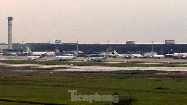  Máy bay ngủ la liệt trên sân bay Nội Bài do ảnh hưởng của đại dịch COVID-19 - Ảnh 12.