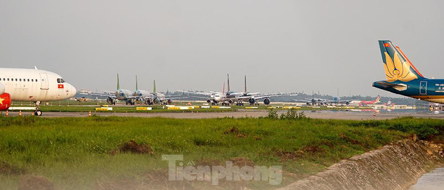  Máy bay ngủ la liệt trên sân bay Nội Bài do ảnh hưởng của đại dịch COVID-19 - Ảnh 7.