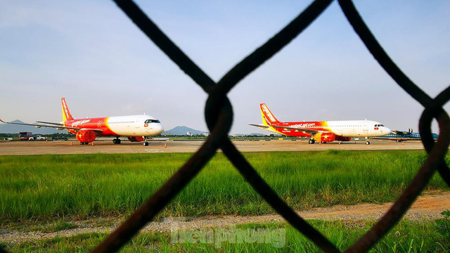  Máy bay ngủ la liệt trên sân bay Nội Bài do ảnh hưởng của đại dịch COVID-19 - Ảnh 8.