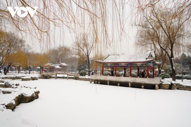 Bắc Kinh ngập trong tuyết trước thềm Olympic mùa đông - Ảnh 1.