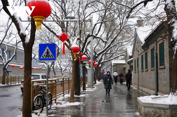 Bắc Kinh ngập trong tuyết trước thềm Olympic mùa đông - Ảnh 10.