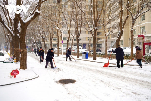 Bắc Kinh ngập trong tuyết trước thềm Olympic mùa đông - Ảnh 12.