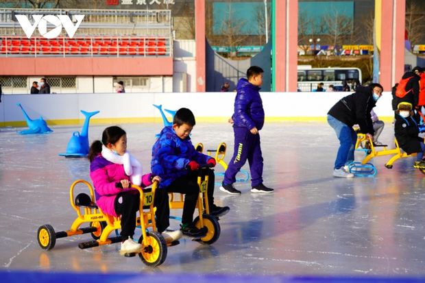  Đường phố Bắc Kinh trang hoàng rực rỡ đón Tết Nhâm Dần và Olympic mùa Đông - Ảnh 16.