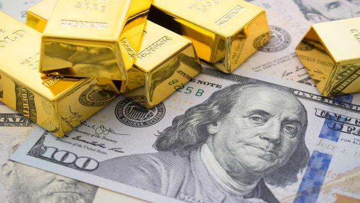 USD, vàng tăng trở lại do Trung Quốc nới lỏng các biện pháp chống COVID - Ảnh 1.