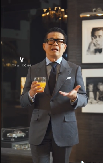 Designer Thai Cong uses a glass of orange juice to 