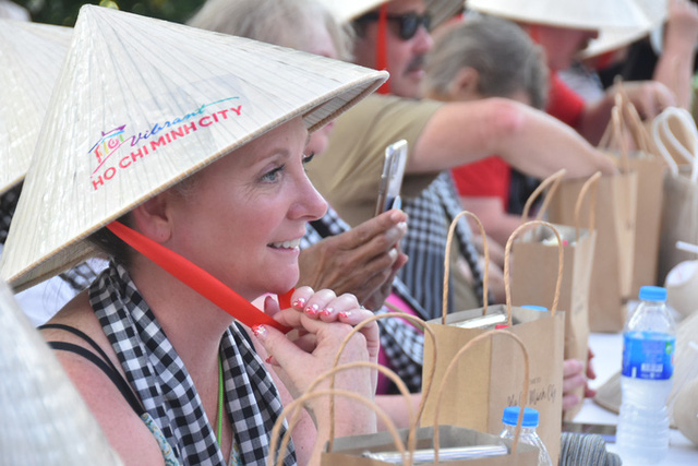   Ho Chi Minh City welcomes a large international tourist group from the US - Photo 4.