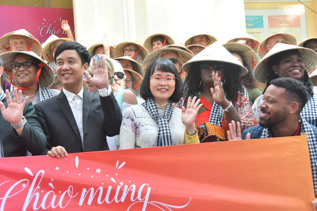   Ho Chi Minh City welcomes a large international tourist group from the US - Photo 6.