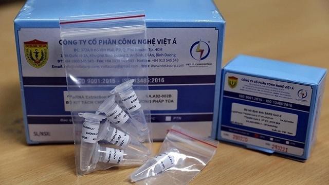 Việt Á cho Bà Rịa-Vũng Tàu mượn máy xét nghiệm và hàng chục ngàn kit test - Ảnh 1.
