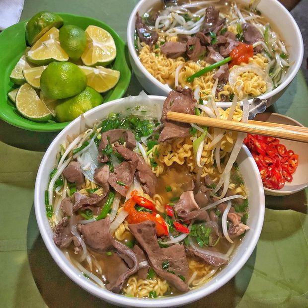  10 spicy and sour noodle shops across Hanoi, eat right away to beat the cold in mid-May - Photo 10.