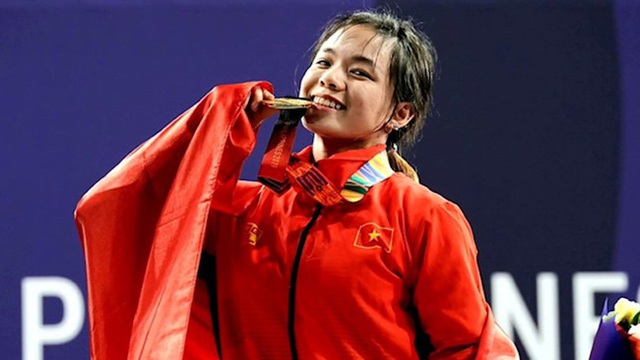   Pham Thi Hong Thanh: From female student Hai Duong, she fell in love with weightlifting when she entered Nghe An... to learn to swim to the champion of Southeast Asia, and at the same time broke 3 SEA Games records - Photo 2.
