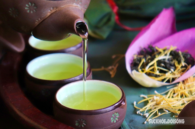 The feat of marinating tea encapsulates the essence of thousands of West Lake lotus flowers - Photo 11.