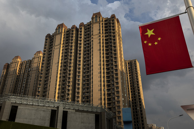 Người dân Trung Quốc từ chối thanh toán tín dụng bất động sản vì mãi không nhận được nhà - Ảnh 1.