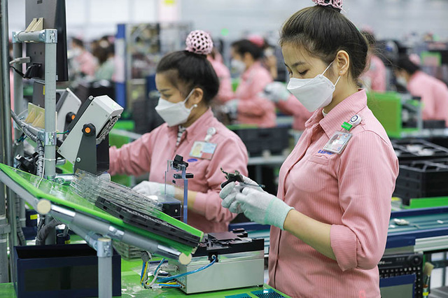 Việt Nam: Cứ điểm sản xuất hàng điện tử của thế giới - Ảnh 1.