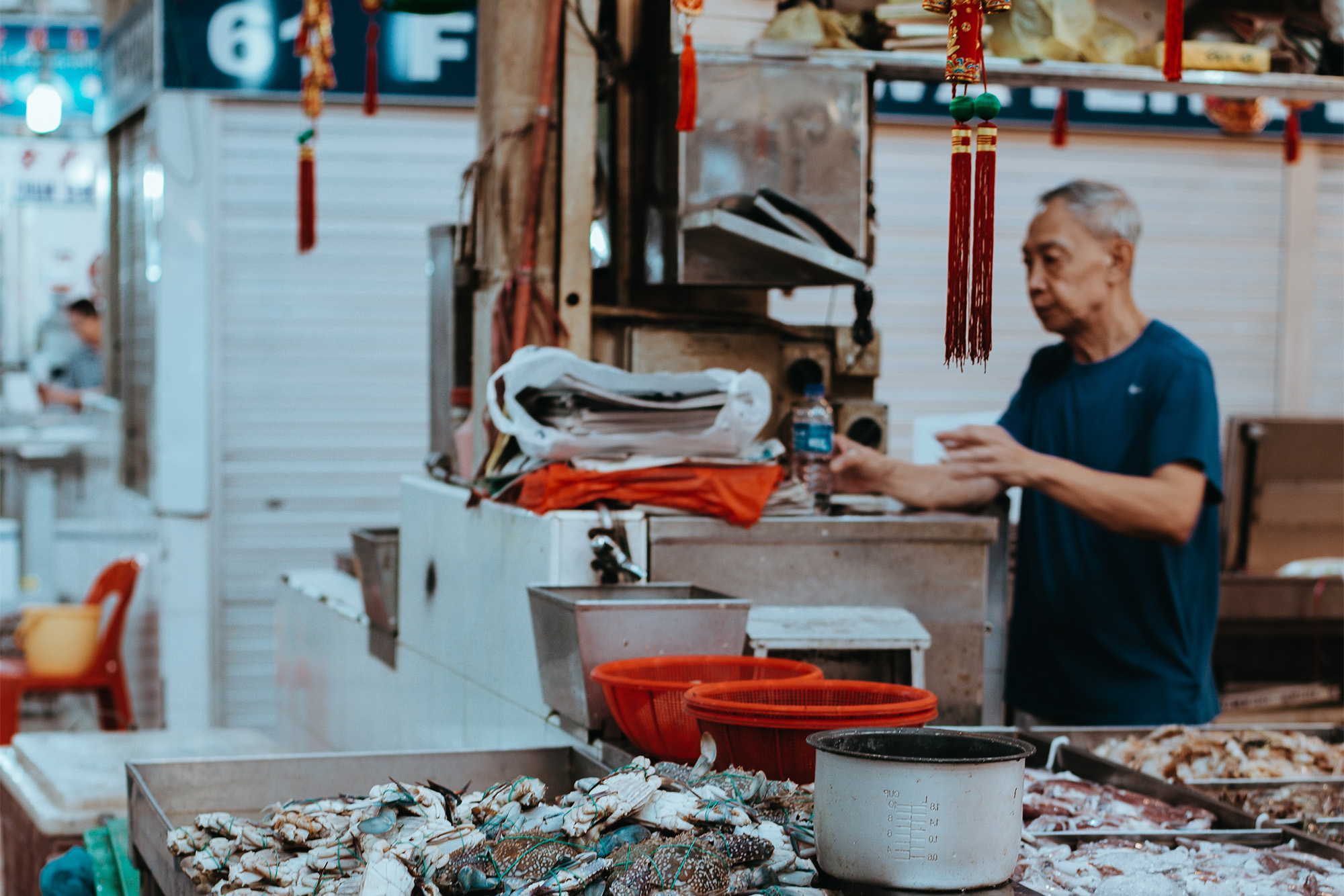 Singapore: Người cao tuổi nhọc nhằn trong 'bão giá' - Ảnh 1.