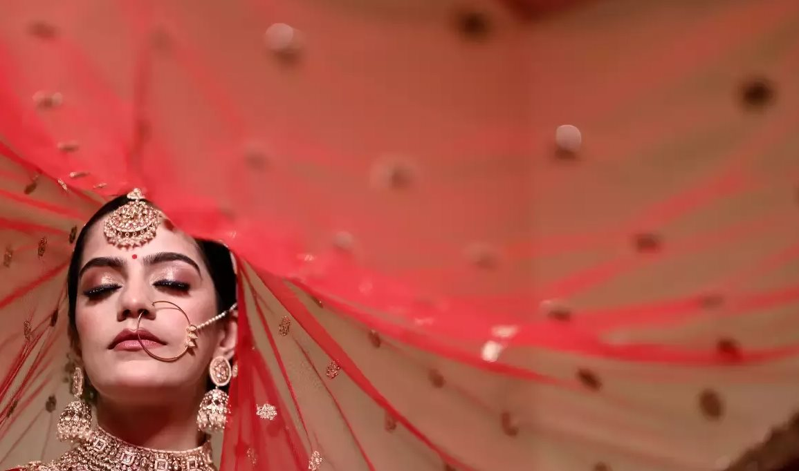 Mùa cưới tỷ đô: Thỏi ‘nam châm hút tiền’ ở một quốc gia châu Á, hàng trăm tấn vàng trở thành sính lễ - Ảnh 1.