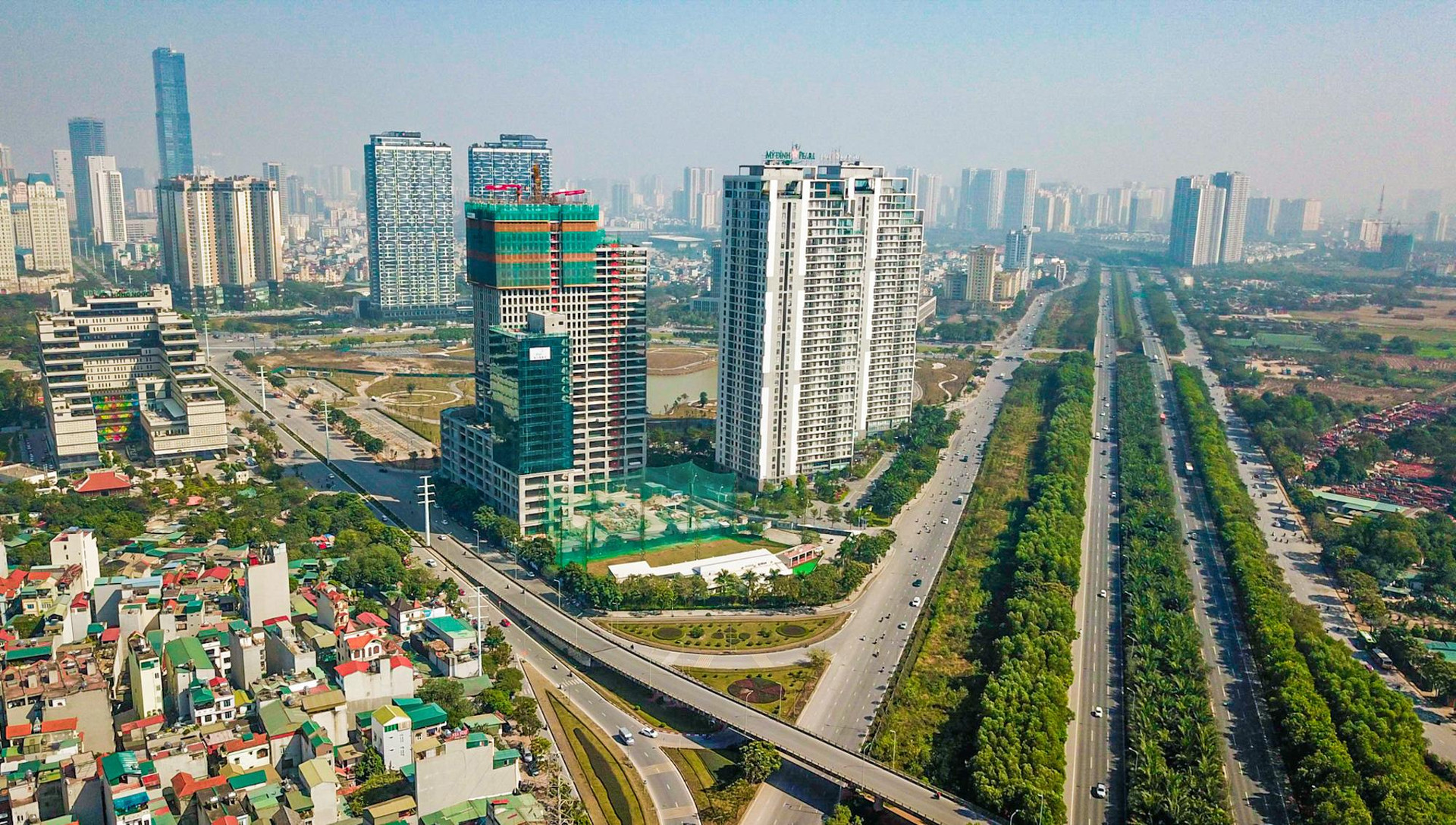 [Photo Essay] Đại Lộ Thăng Long - &quot;bến đỗ&quot; của loạt đại gia bất động sản - Ảnh 5.