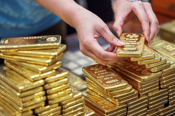 Tăng lượng mua 5 tháng liên tiếp trong khi đã sở hữu kho vàng dự trữ hơn 2.000 tấn, Trung Quốc đang 'tính toán' điều gì? - Ảnh 1.