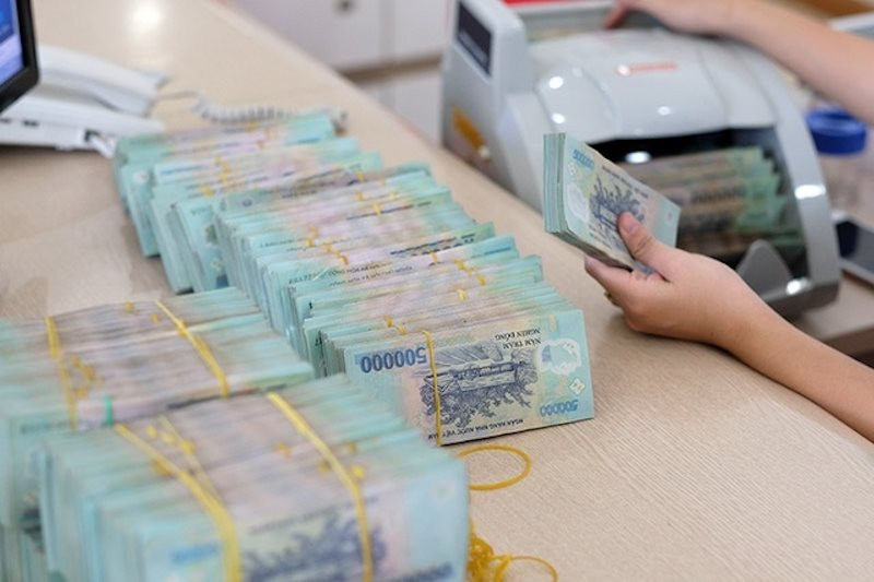 Lãi suất liên ngân hàng giảm về vùng 1%, gói hỗ trợ thanh khoản 20.000 tỷ của NHNN liên tục bị ế - Ảnh 1.