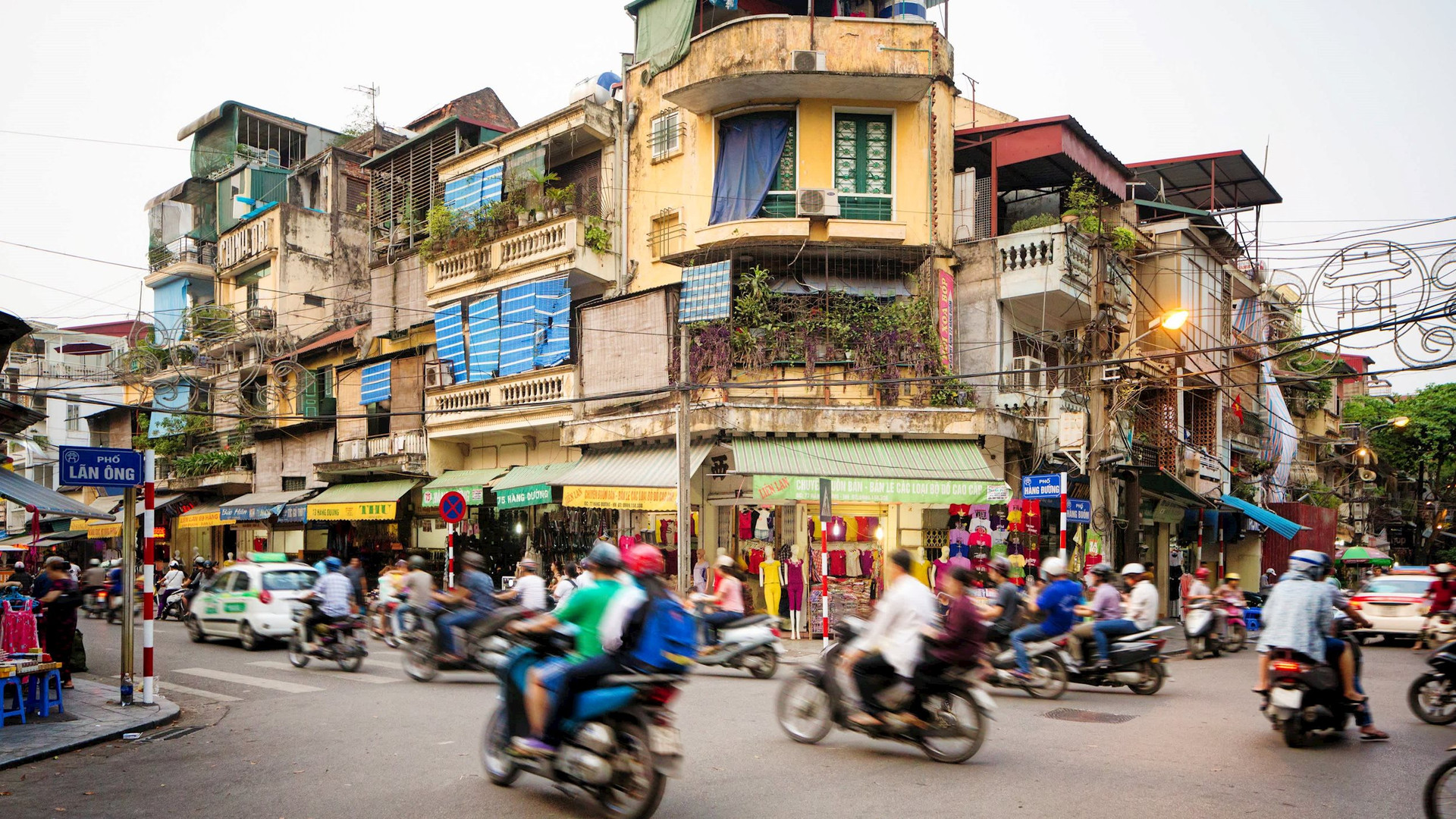 Tổ chức tín nhiệm quốc tế xếp kinh tế Việt Nam ở mức "tích cực" - Ảnh 2.