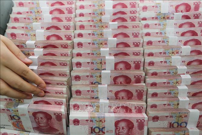 Trung Quốc hạ lãi suất cơ bản để hỗ trợ nền kinh tế - Ảnh 1.