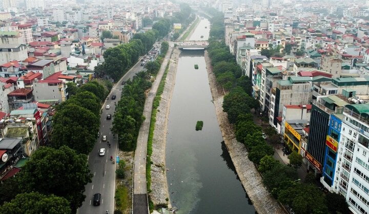 Hà Nội làm làn đường dành riêng cho xe đạp ven sông Tô Lịch - Ảnh 1.