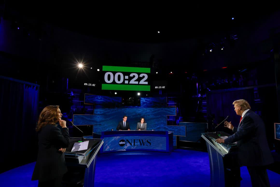 A countdown clock over debate moderators David Muir and Linsey Davis shows how much time Trump has left to answer a question during his with Harris on September 10. Michael Le Brecht II/ABC News