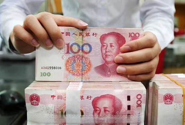 Người dân Trung Quốc rút khoảng 262 tỷ USD tiền tiết kiệm trong tháng 4- Ảnh 1.