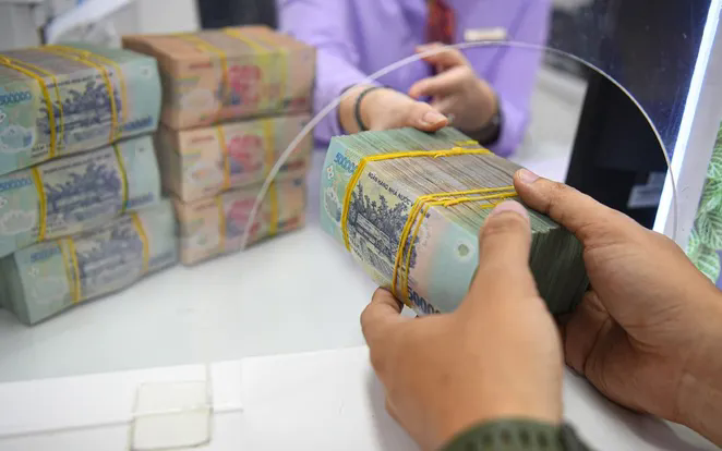 Tăng lãi suất huy động giúp ổn định tỷ giá- Ảnh 1.