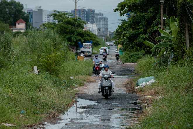 Chùm ảnh hai thế giới song song giữa lòng TP.HCM: Bức tranh tương phản về chỗ ở- Ảnh 14.