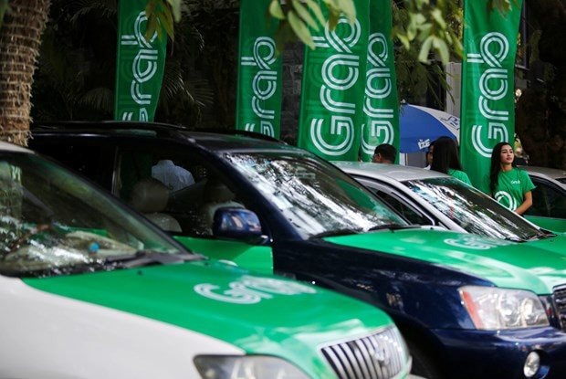 Grab mua 50.000 xe điện của BYD, tham vọng bá chủ dịch vụ taxi tại Đông Nam Á- Ảnh 1.