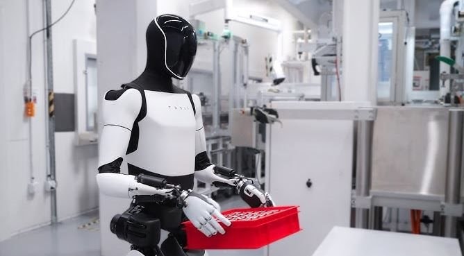 Bên trong phòng thí nghiệm robot của Tesla: Nhân viên phải mặc đồ chuyên biệt, đeo gần 20kg thiết bị trên lưng để ghi hình