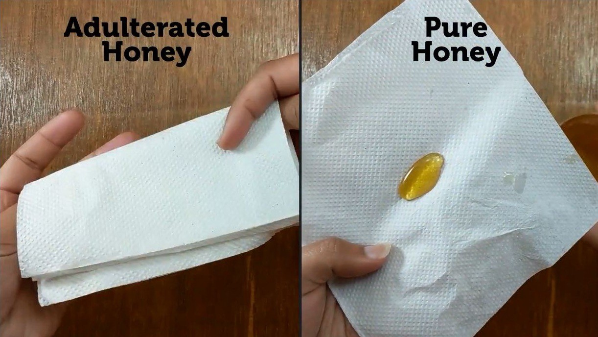 Tại sao phải lật ngược lọ mật ong khi mua? 5 mẹo "bắt bài" mật ong giả người "sành" mới biết - Ảnh 2.